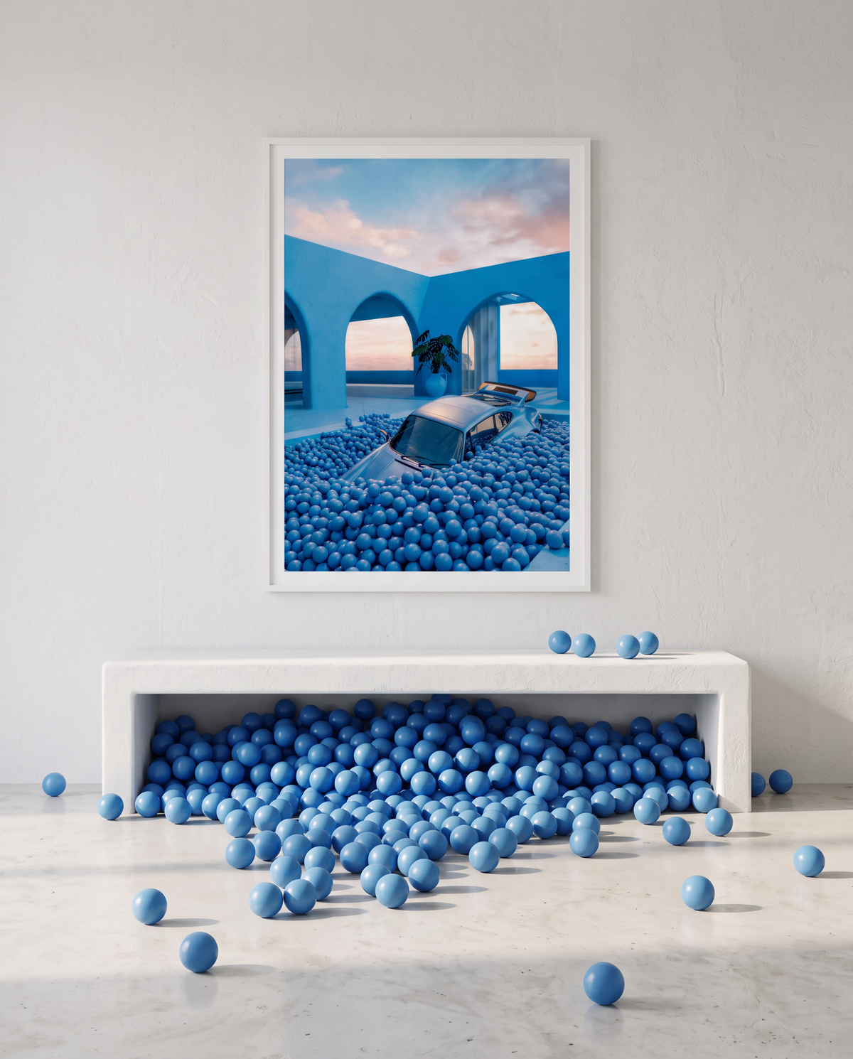 AZUR 01 framed above a white bench, blue balls piled underneath and rolling across the floor