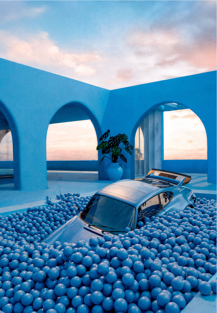 AZUR 01, a blue classic car sinking into a pool of blue balls in a blue villa at sunset